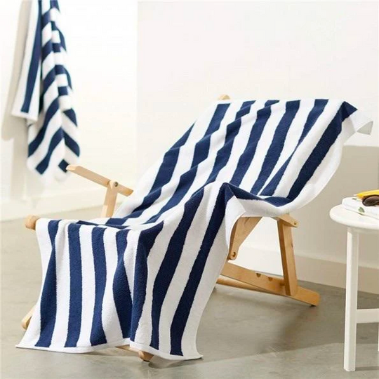 striped towel on wooden chair